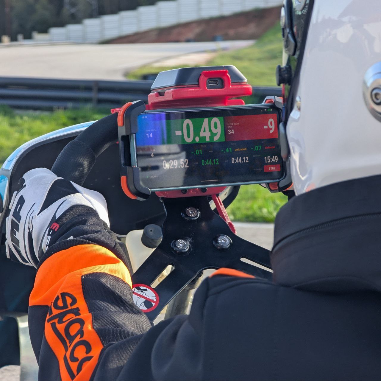 RaceCling phone mount for RaceBox Mini on a Sodi rental kart